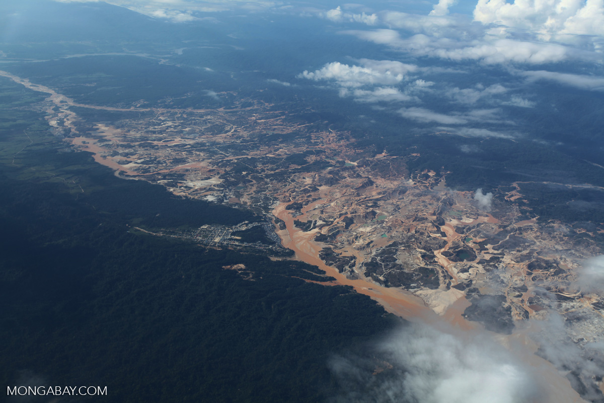 Overhead view of the Rio Huaypetue gold mine in the Amazon rainforest